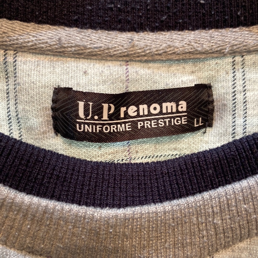 Grey long sleeve shirt of a brand I am not familiar with.